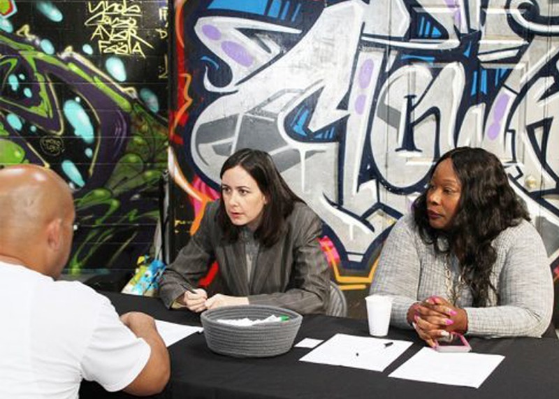 Deputy Public Defenders Ashley Price and Ericka Wiley provide post-conviction relief during a Prop 47 event at Chuco’s Justice Center in Inglewood.