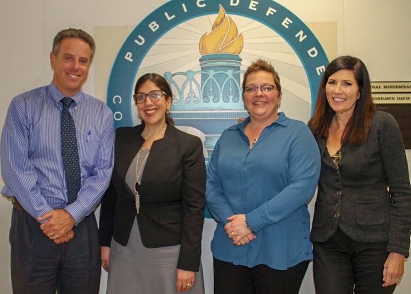 DPD Justine Esack (second from left) sought out Project RESTORE for help on a case with a successful outcome. RESTORE’s founders are Head Deputy Mitch Bruckner (left), Social Worker Manager Tracie Jones and DPD Nancy Richards-Chand.