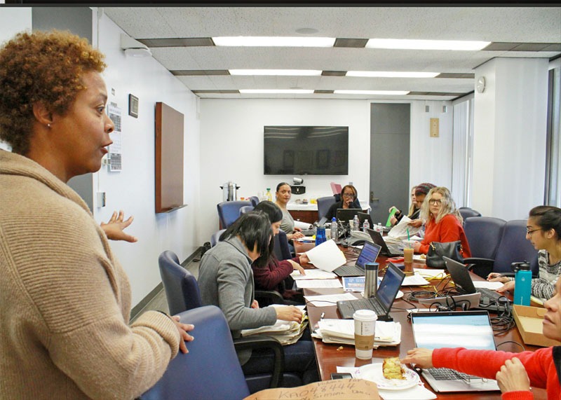 Assistant Public Defender Candis Glover instructs a team screening for Franklin and Cook cases at the Clara Shortridge Foltz Criminal Justice Center downtown LA.